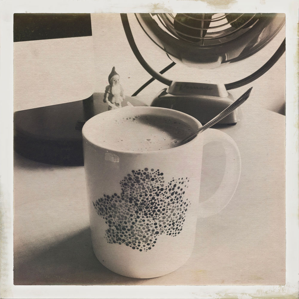 photo of a warm cup of coffee.