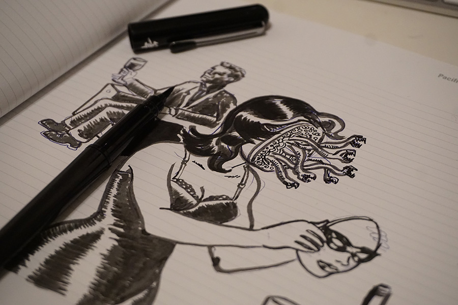 another close up photo of my sketchbook doing an inktober drawing.