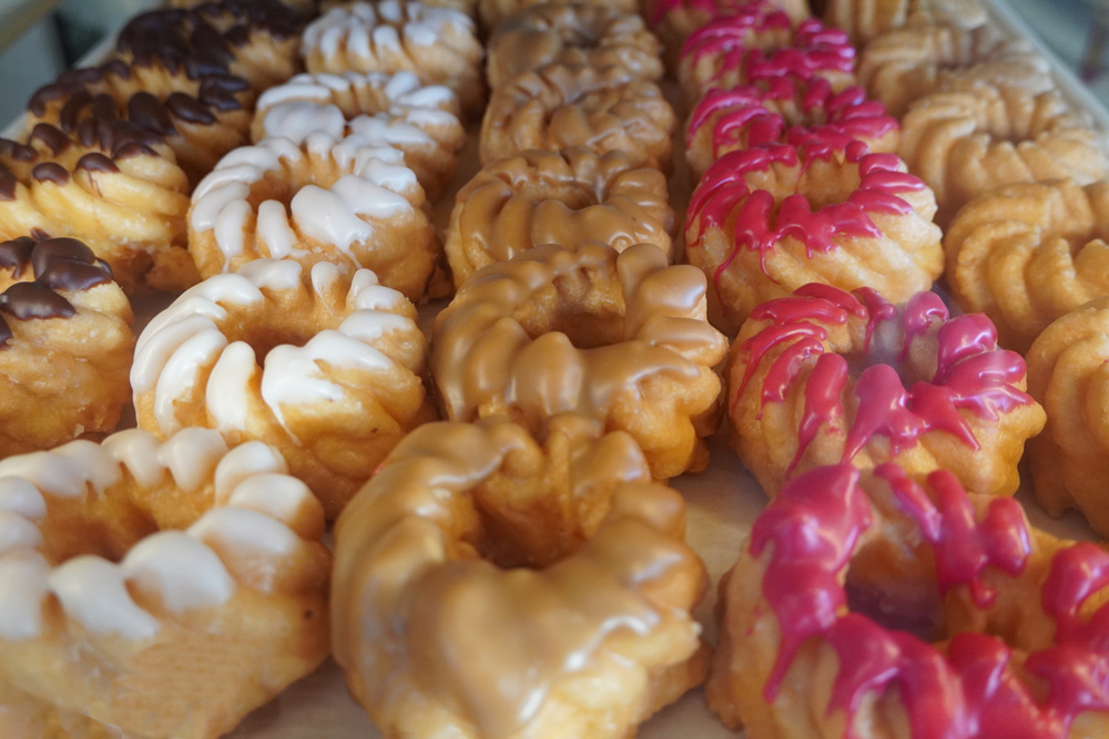 Photo of cruller donuts.