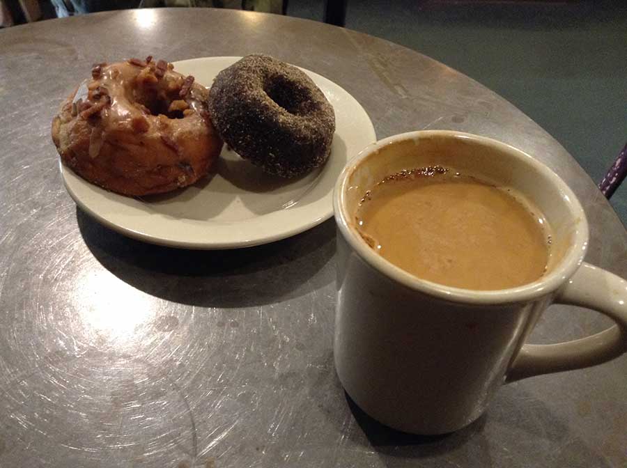 photo of coffee cup and donuts at Dynamo Donuts in San Francisco